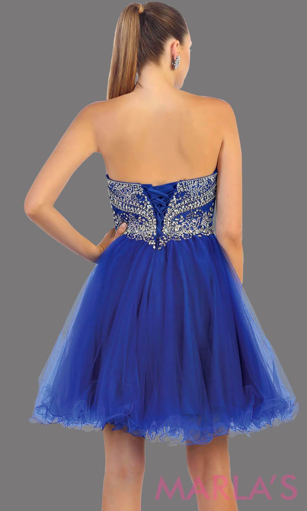 Back of short strapless puffy royal blue dress. This short blue grade 8 graduation dress has sequin bodice and corset back. This is perfect for homecoming, semi formal, bridal shower. Available in plus sizes